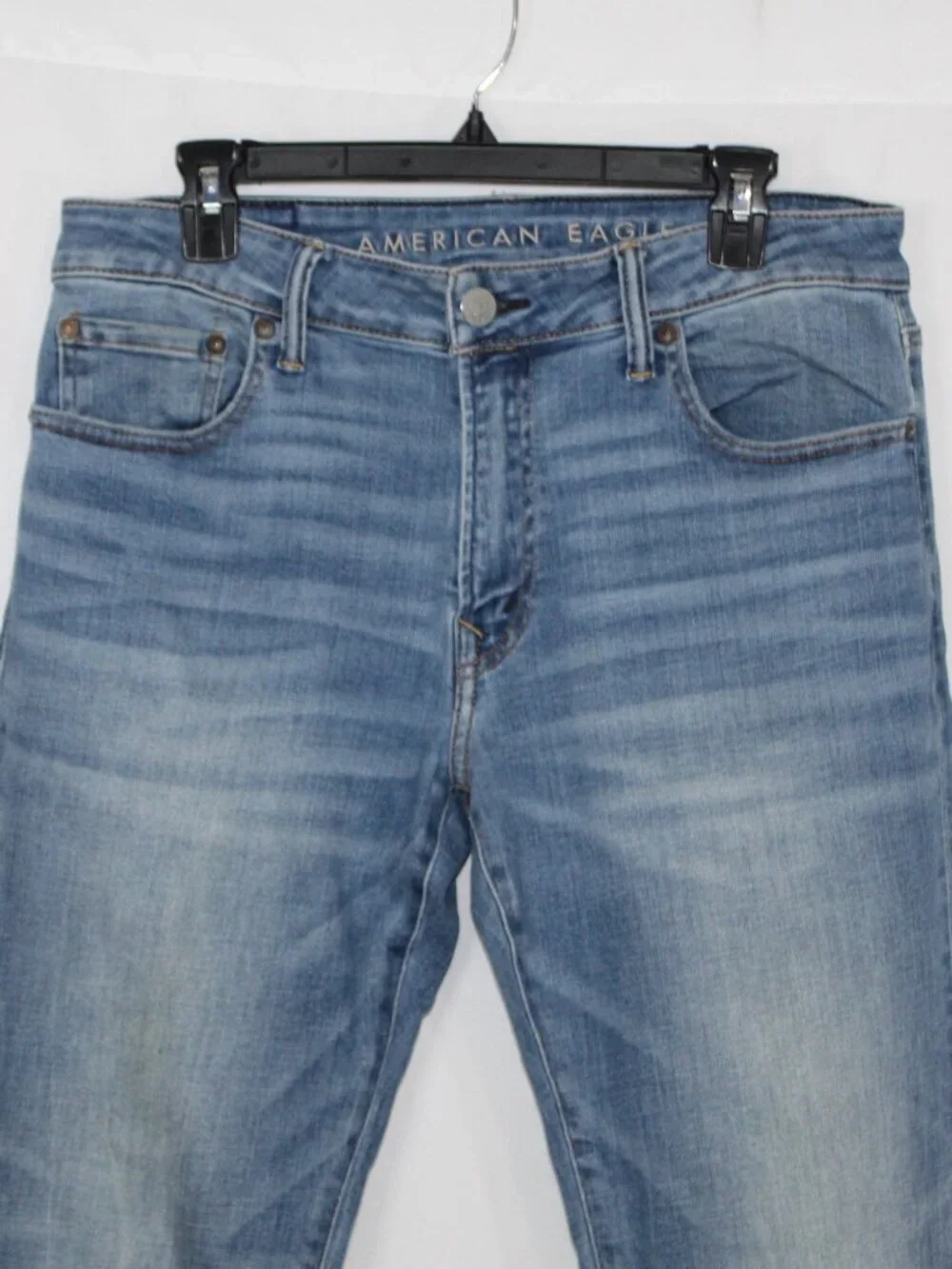 American Eagle slim straight next level stretch medium wash mid rise